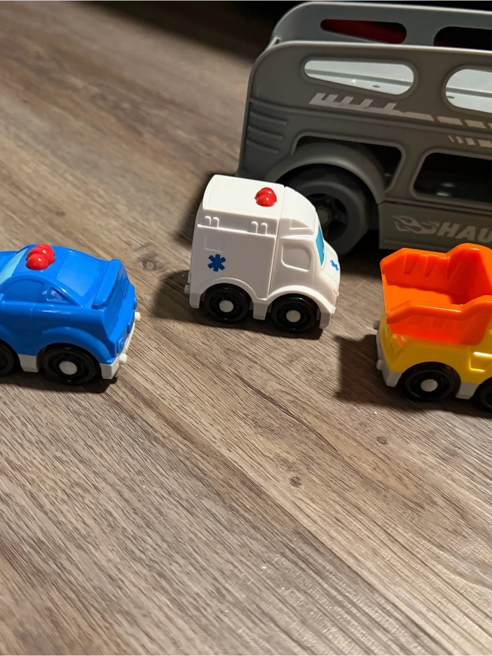 Kids Red and Gray Haul Truck Playset with 6 Mini Vehicles (cop, firetruck, etc)